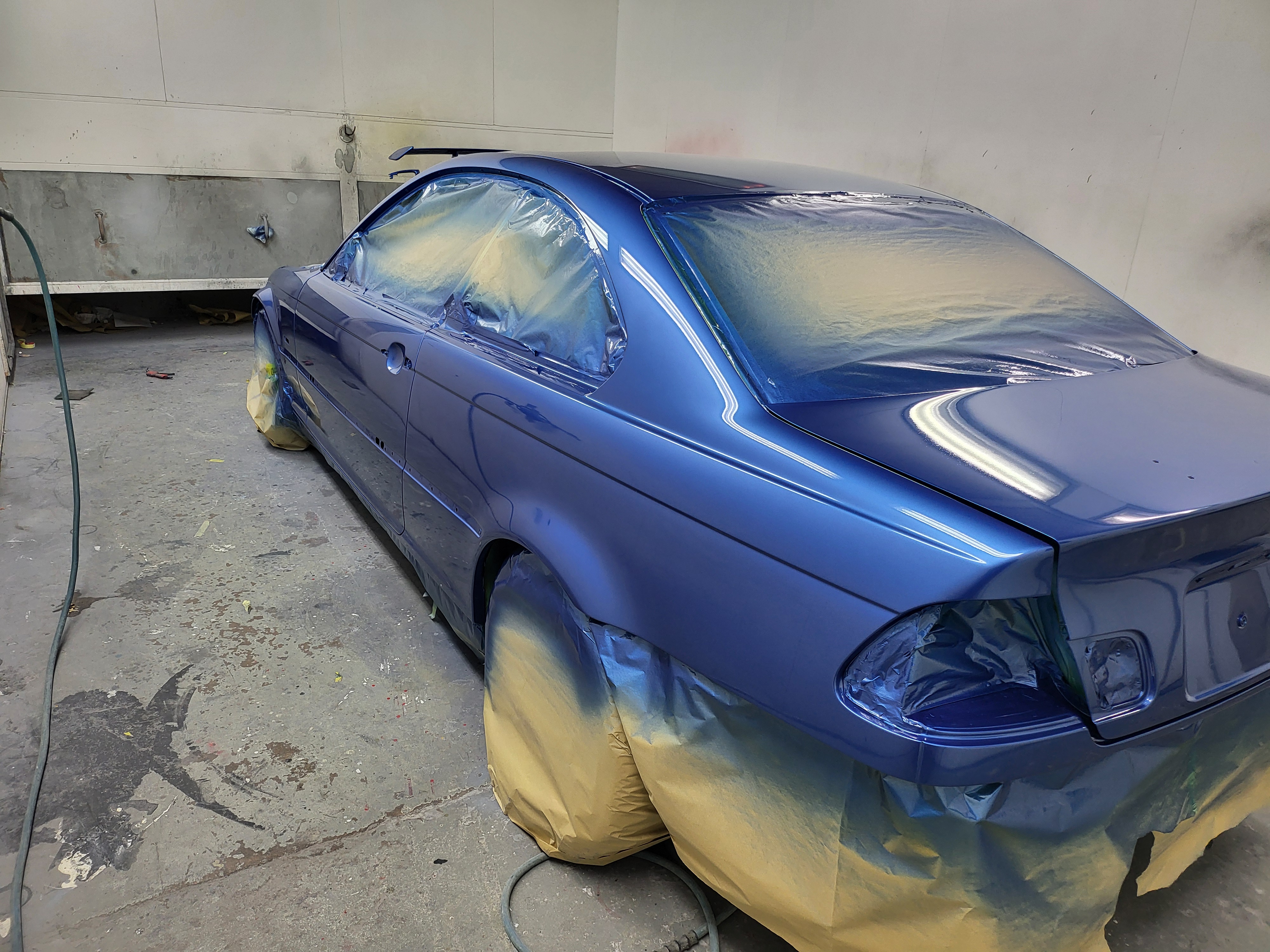 Professional spray painting and color matching on classic car at CJVS Cardiff